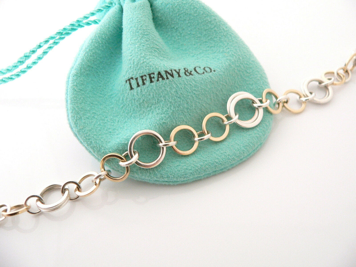 Tiffany & Co 18K Gold 5-Charm Link Bracelet Golden Metal ref.1025347 - Joli  Closet