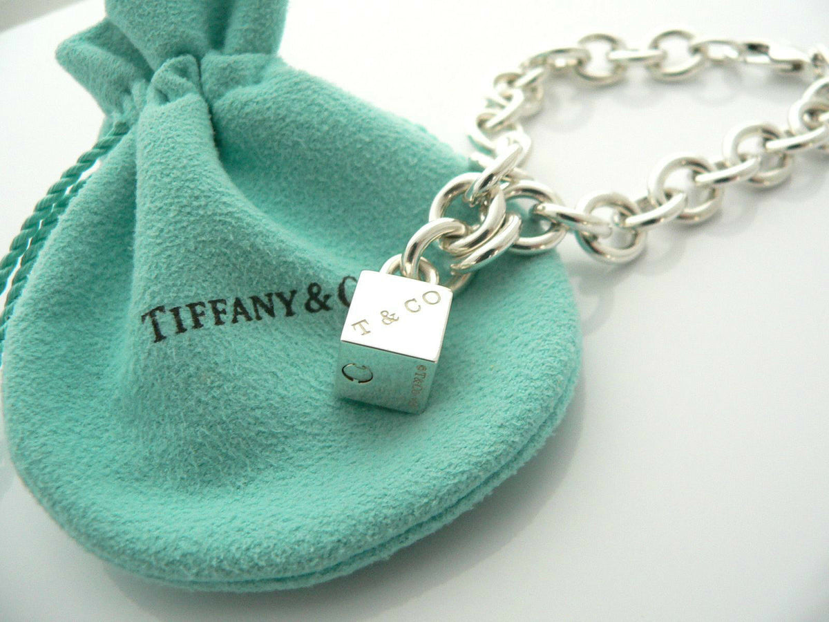 Tiffany & Co. Sterling Silver Bead 1837 Lock Charm Bracelet (SHF-18873 –  LuxeDH
