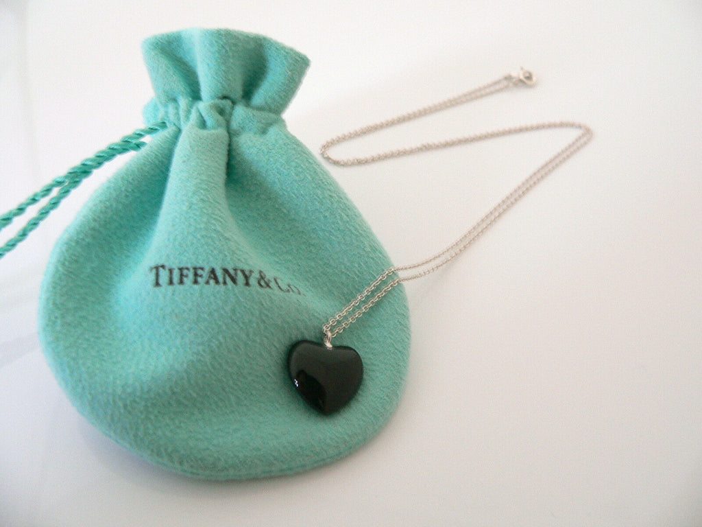 Return to Tiffany™ medium heart tag with key pendant in sterling silver. |  Tiffany & Co.