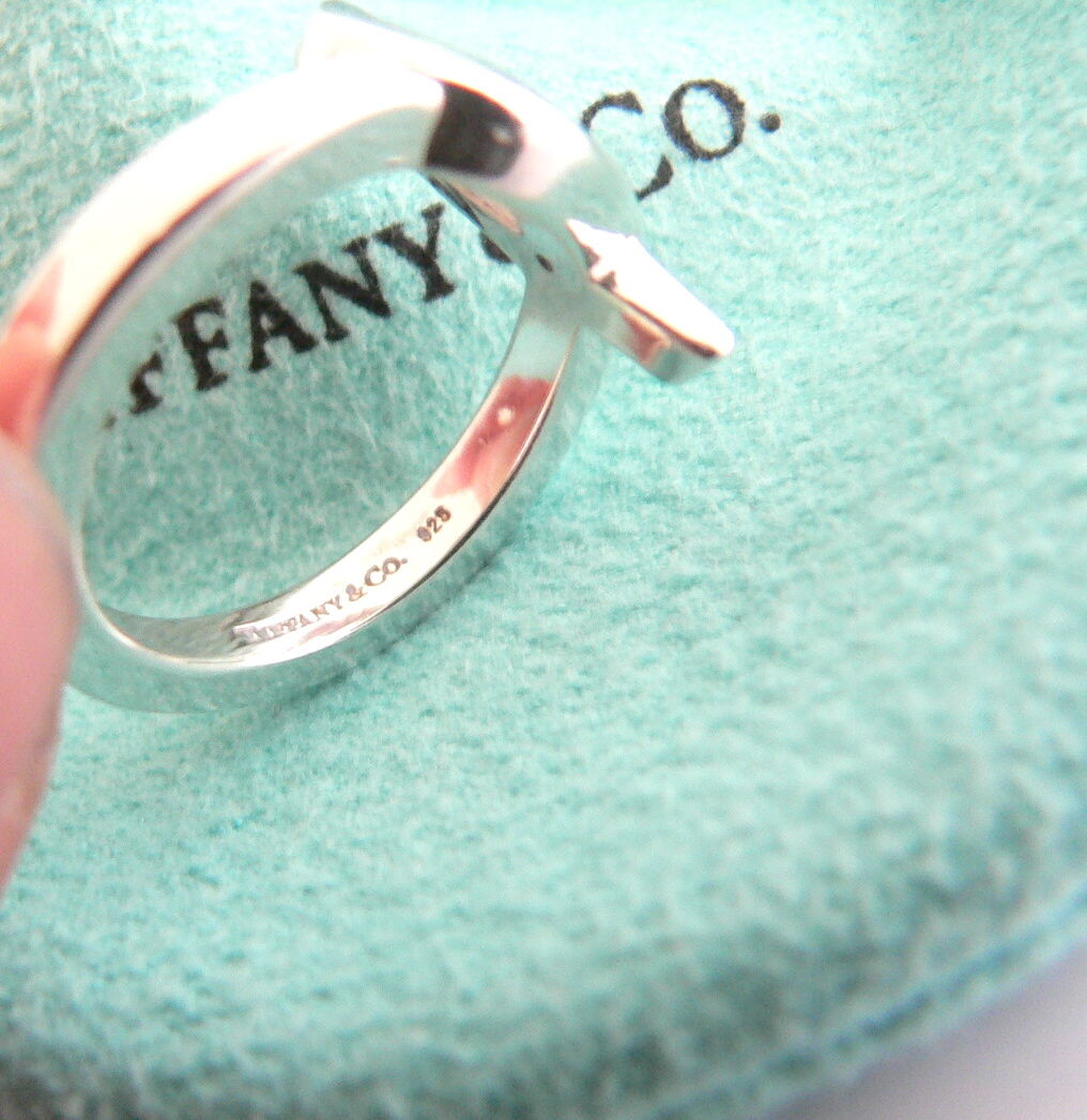 Tiffany & Co. popular Picasso XOXO streaking silver ring Sz. 5