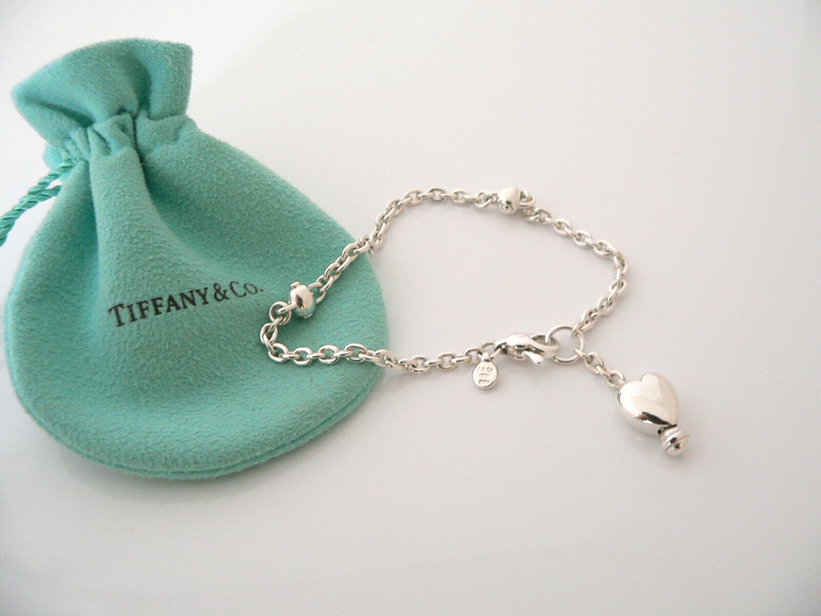 Tiffany & Co Silver Shopping Bag Bracelet Bangle Charm 7.5 Inch