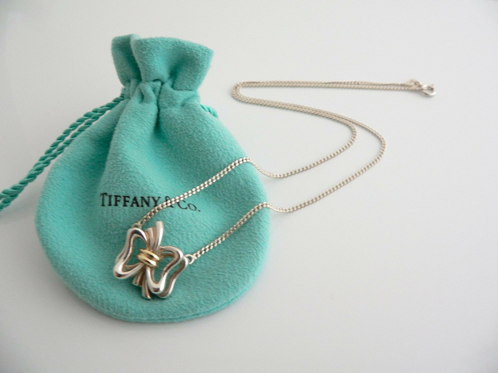 Tiffany selling ribbon charm