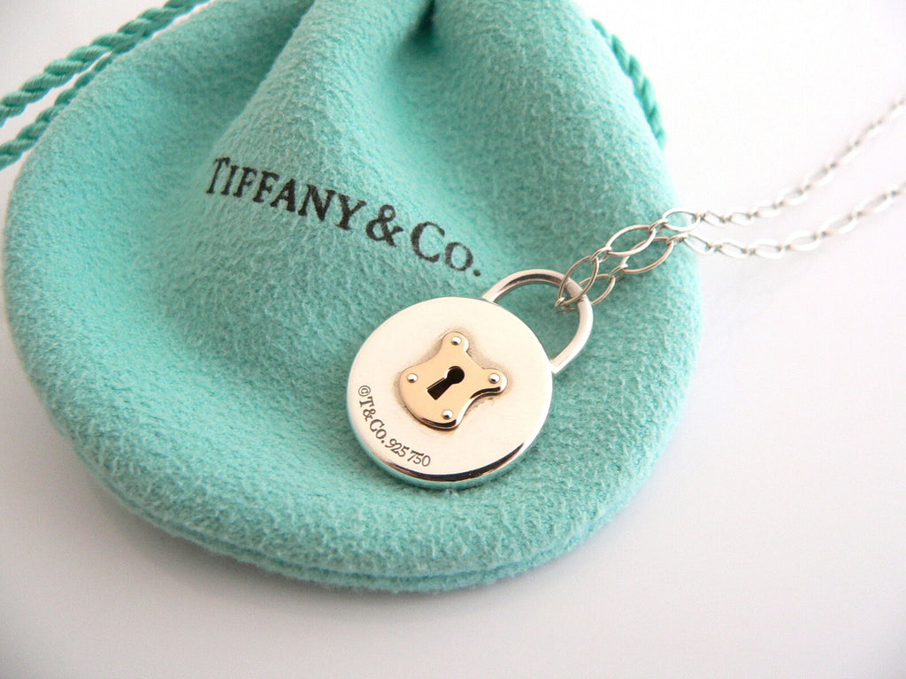 Authentic Tiffany & Co. Silver and 18K Gold Round Mini Lock 