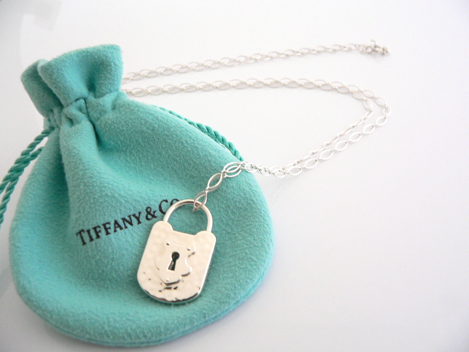 Tiffany & Co. Silver Love Lock & 18kt Gold Key Necklace- Evaluated By  Certified Gemologist -AGS/GIA | Property Room